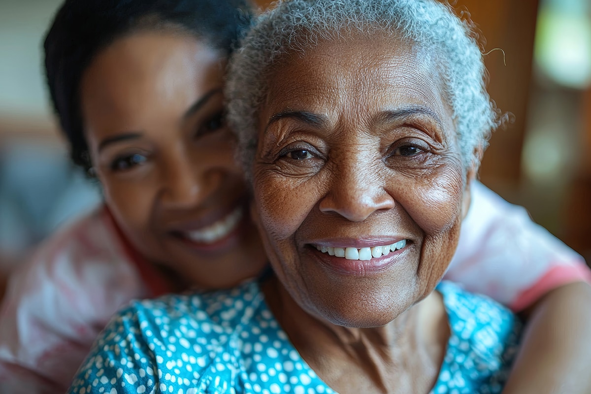 PACS-300x200-caregiver1 Happy senior black woman in a nursing home. Smiling old woman